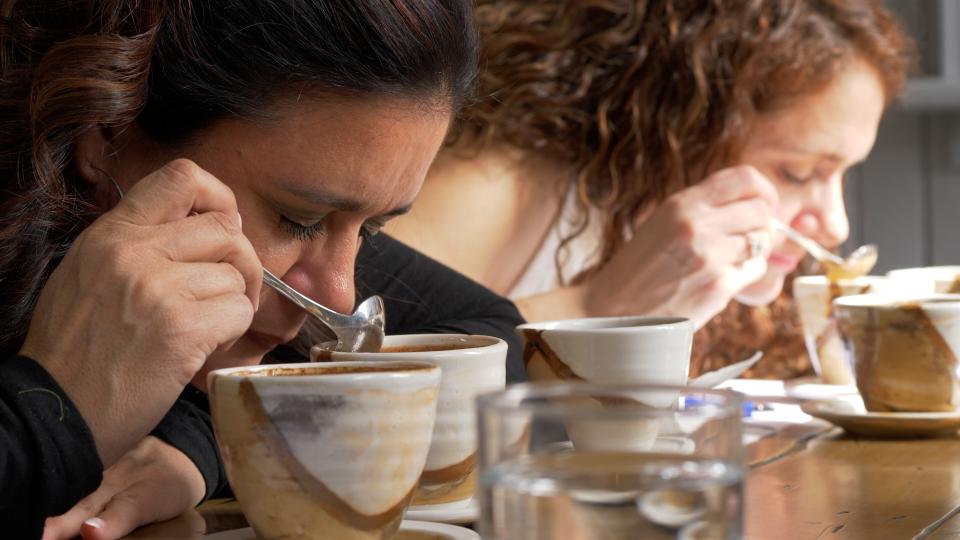 Val and Maria smelling the coffee