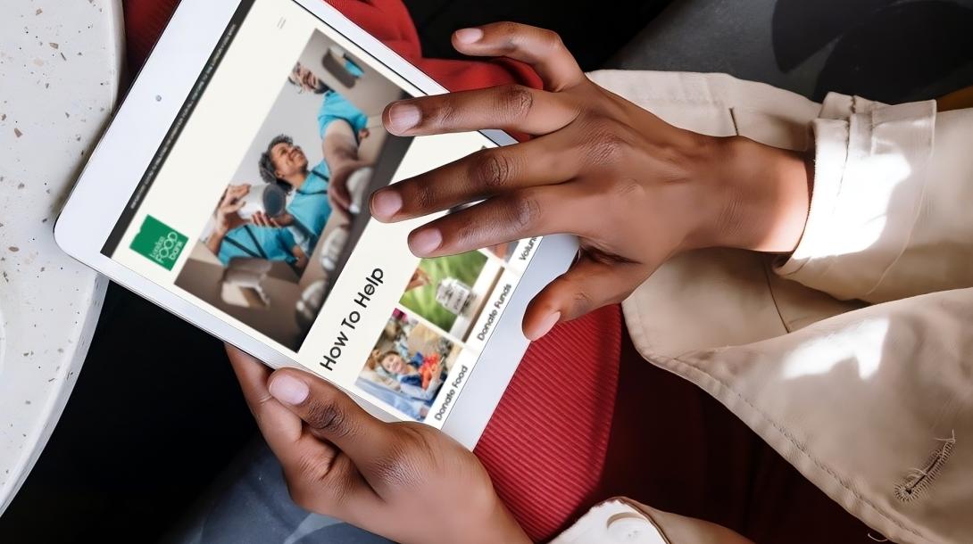 Person using London Food Bank on their tablet