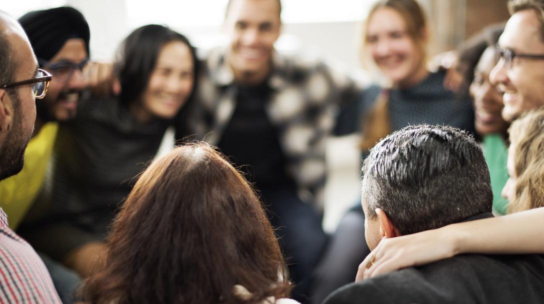 A photo of a group huddle