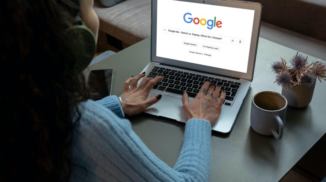 Woman Google Searching for Google Ads - Search vs. Display: Which Do I Choose?