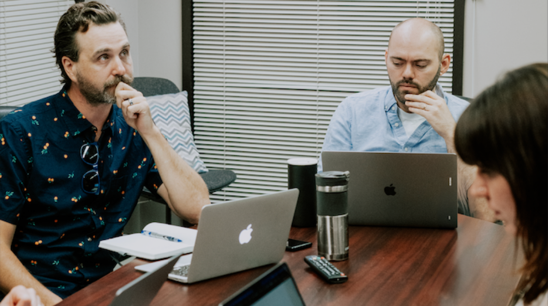 rtraction employees at a table