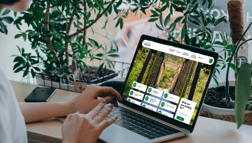 A mockup of a woman on a laptop looking at the Central Huron 