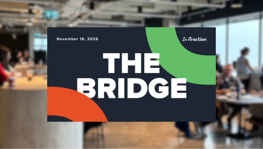 A blurry photos of attendees at the bridge with a graphic on top that says: The Bridge, November 16, 2026, rTraction on a dark blue background with the rTraction logo r in orange and green as design elements.